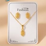gold-plated chain necklace and matching stud earrings,