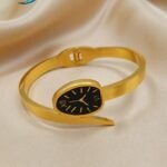 gold-colored watch bracelet